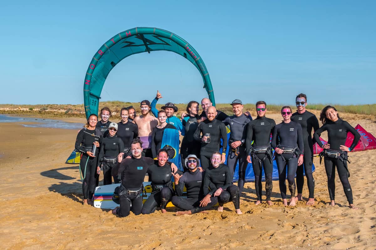 Happy people from kitesurfing camp in Portugal.