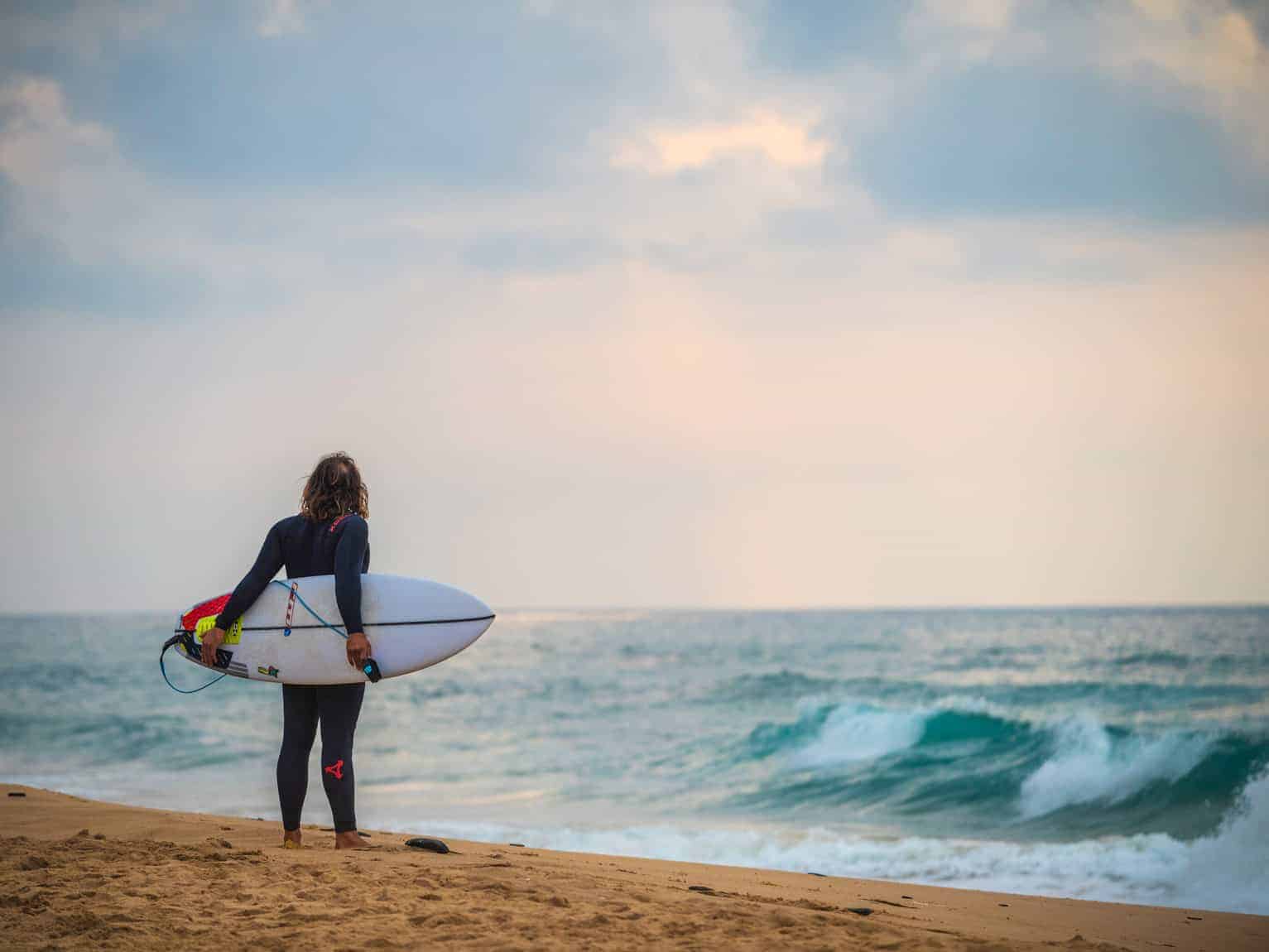 Surf instructor guiding beginner surfers at the Algarve's best beginner surf beaches