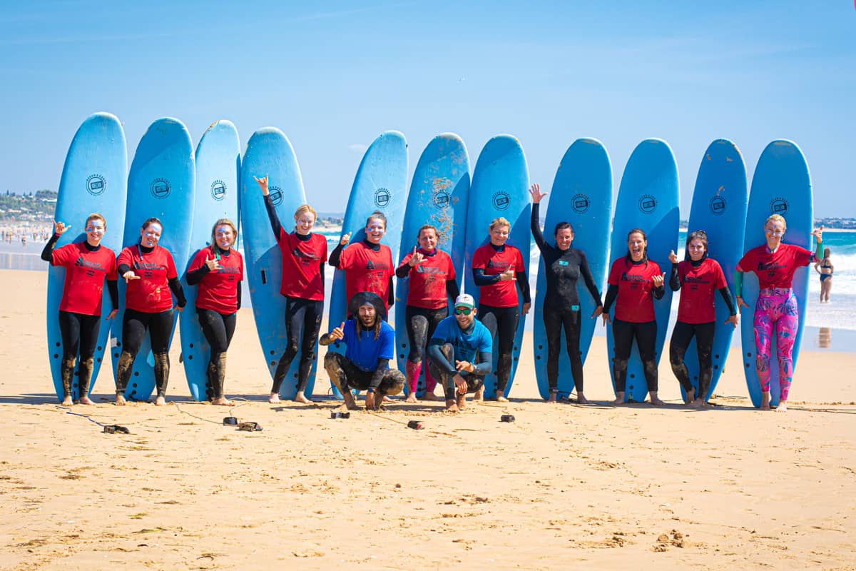 Happy Surfing camp group in Lagos, Portugal