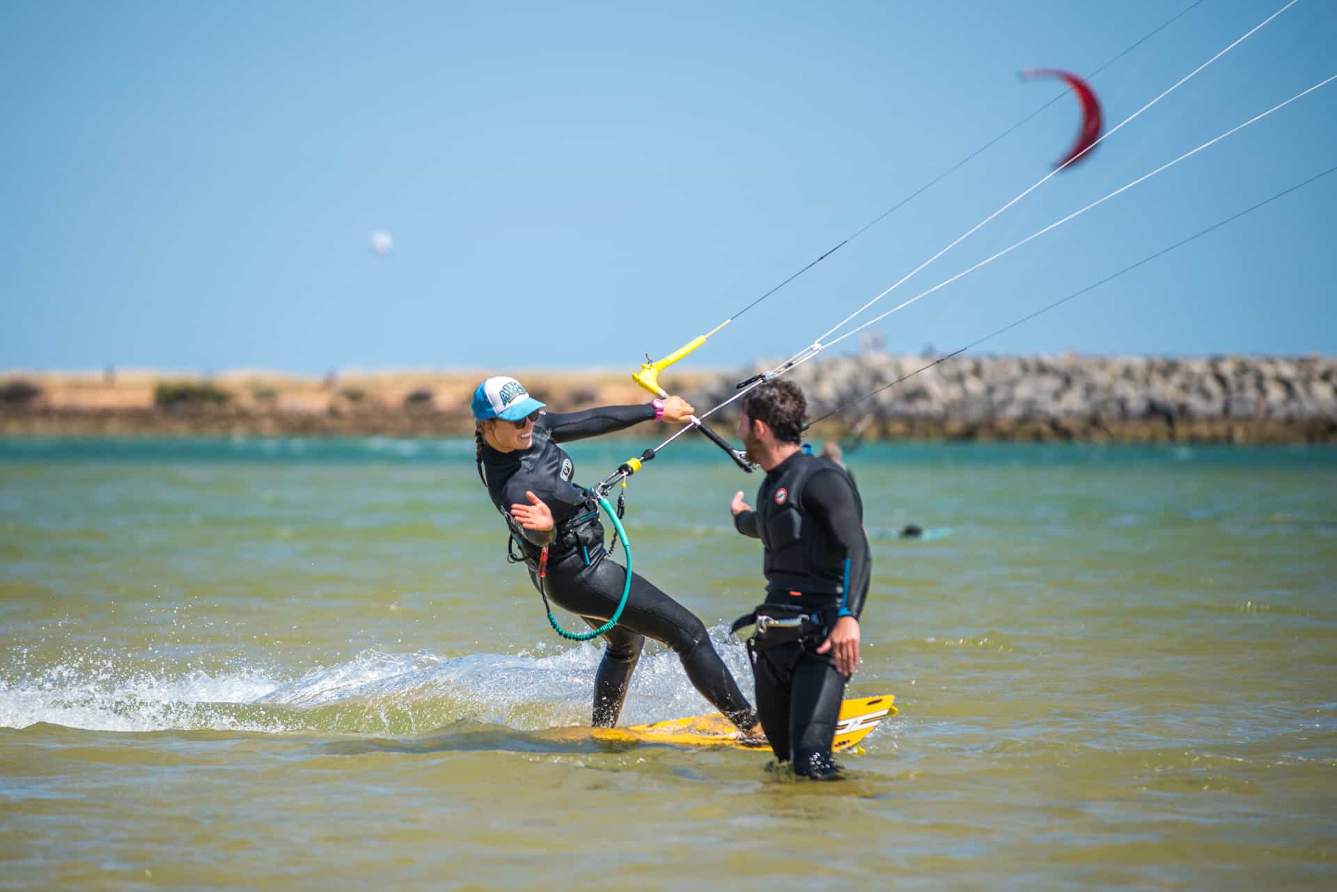 Instructor and student during kitesurfing lesson in Lagos.