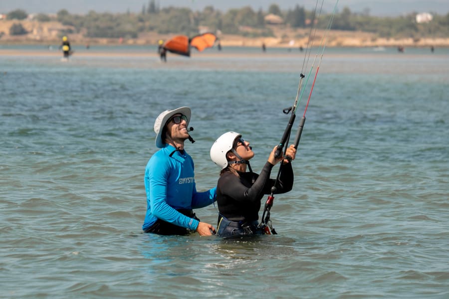 instructor with student during private kitesurfing lesson