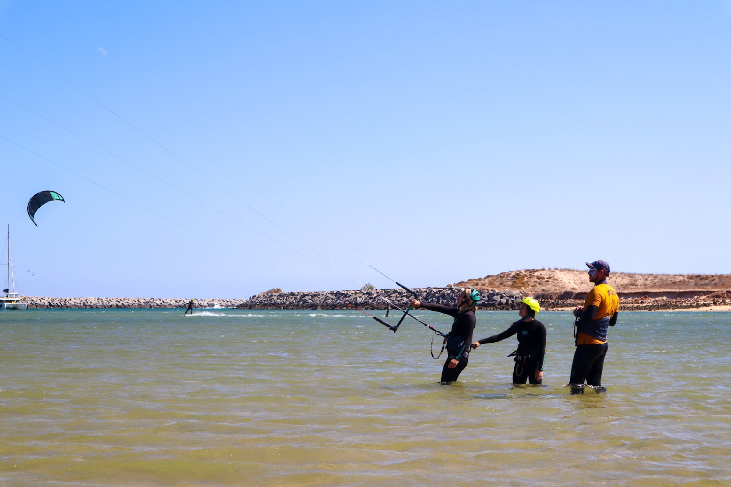 Group kitesurfing lesson with two kites flying — Algarve Watersport Lagos Algarve