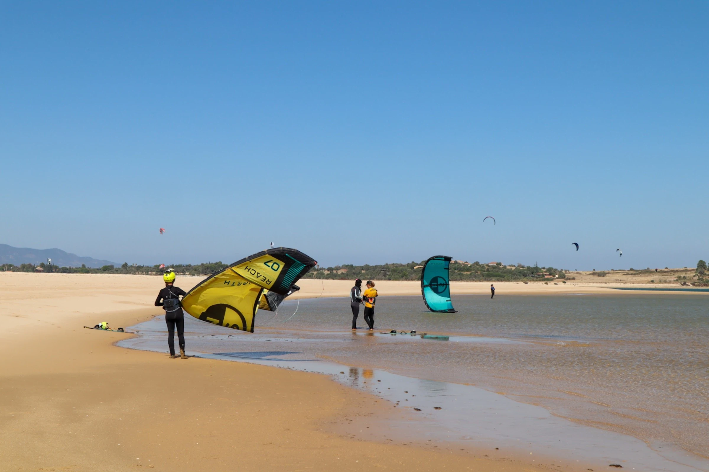 Kites deployed at Ria de Alvor lagoon flat water spot near Lagos