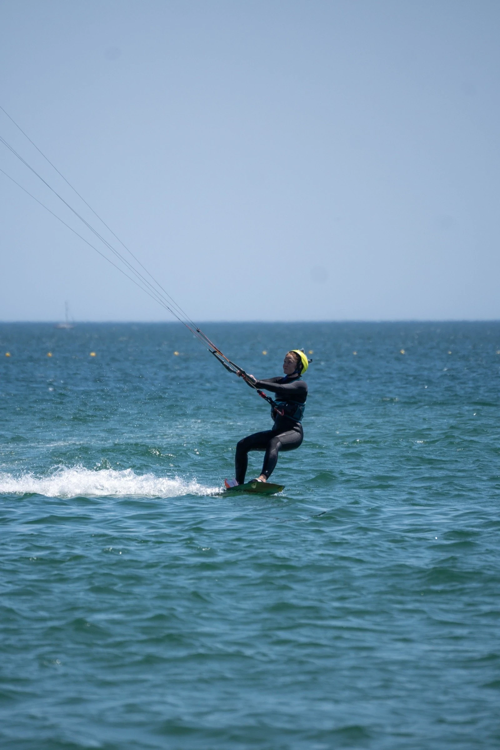 Kitesurf student riding at Meia Praia beach in Lagos Algarve