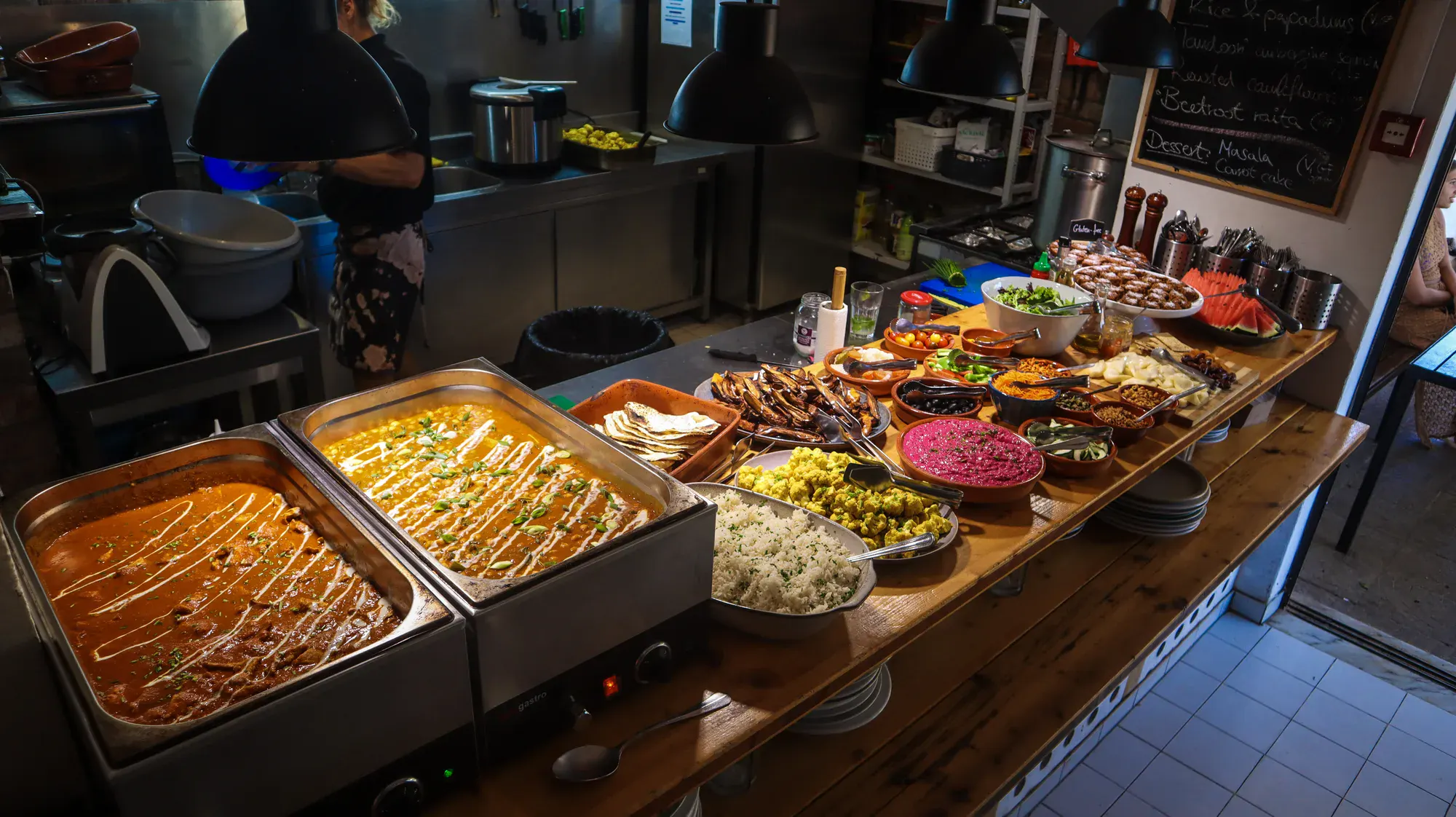 Dinner buffet with curry, rice and hummus at Algarve Watersport surf camp