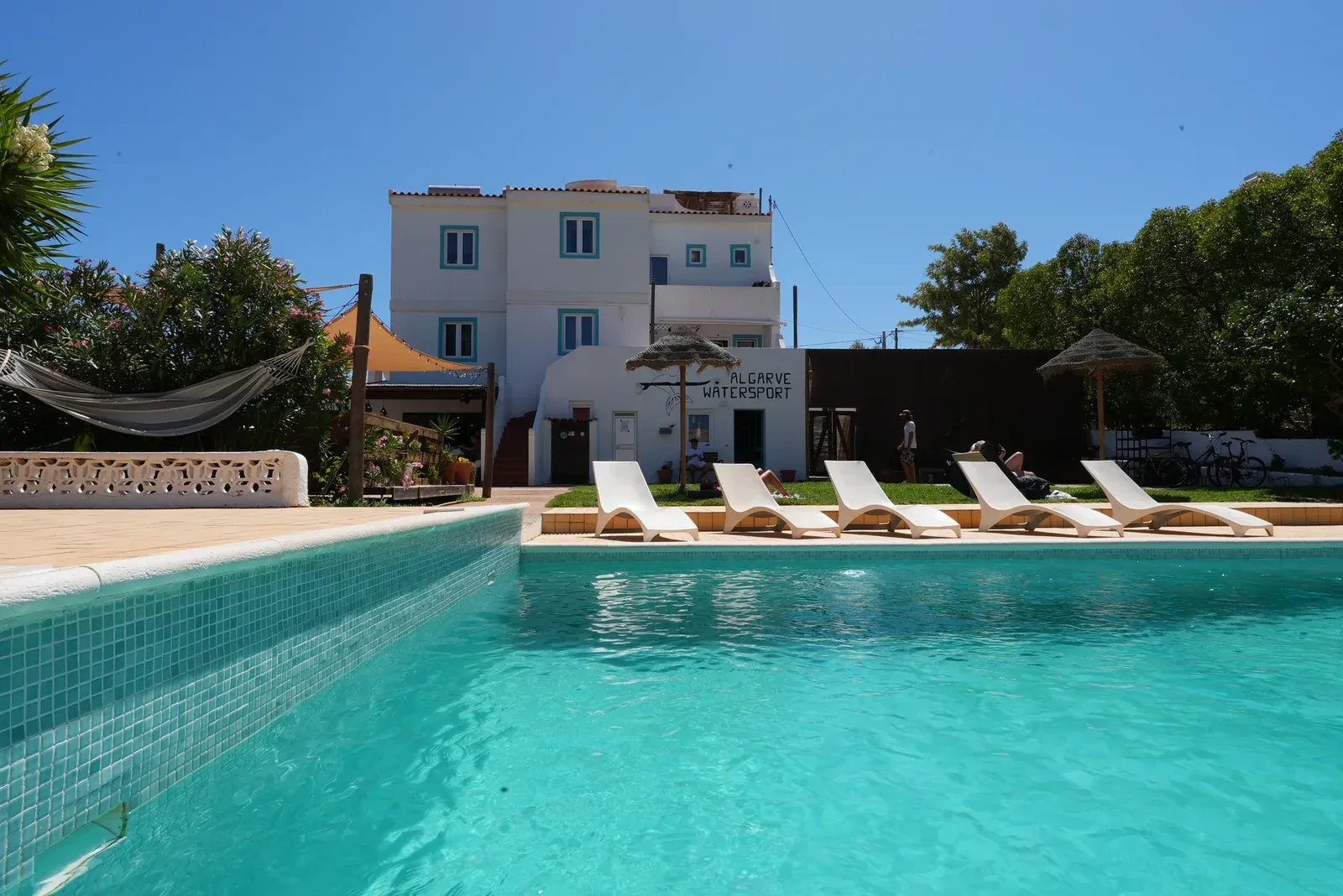 Pool and sun loungers at Algarve Watersport camp