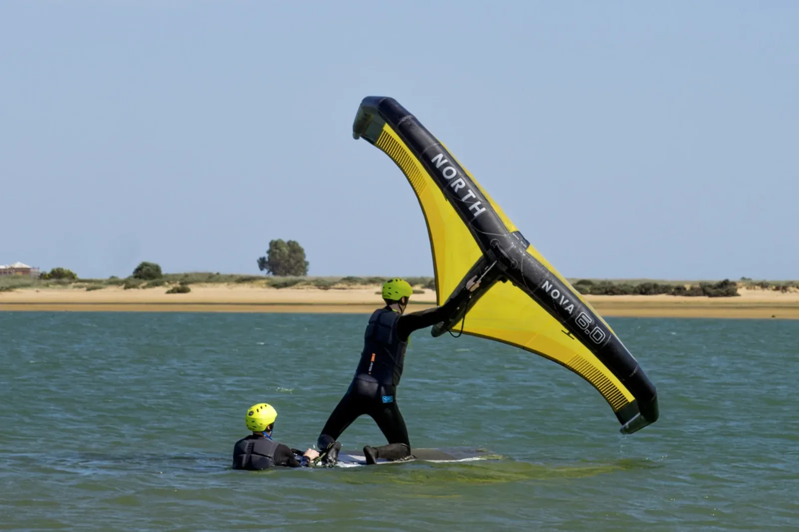 Wingfoil instructor and student at Ria de Alvor lagoon